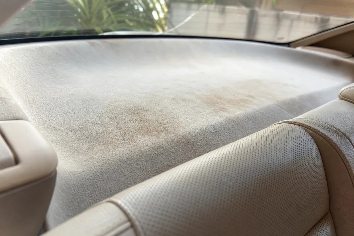 What causes chemical smells in used cars?
